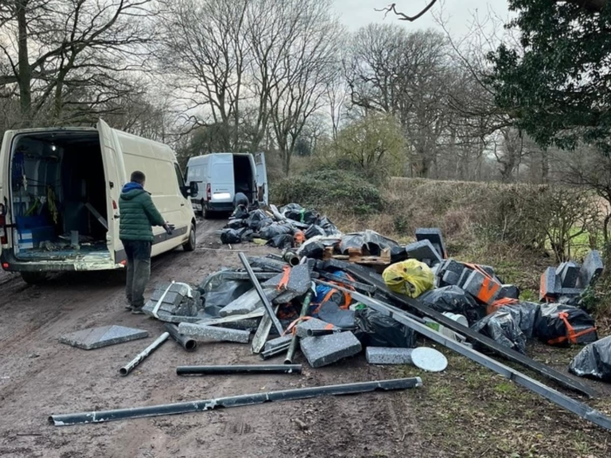 The two fly-tippers dumped rubbish on the site in the West Midlands. (SWNS)