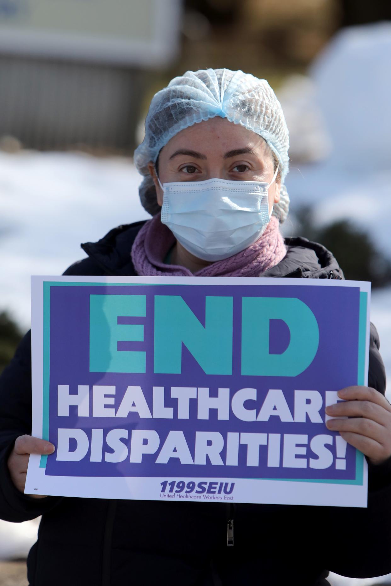 Healthcare worker Wendy Carpio, with 1199SEIU United Healthcare Workers East, rallies outside Good Samaritan Hospital against budget cuts in hospitals and for better Medicaid funding Feb. 22 2024 in Suffern.