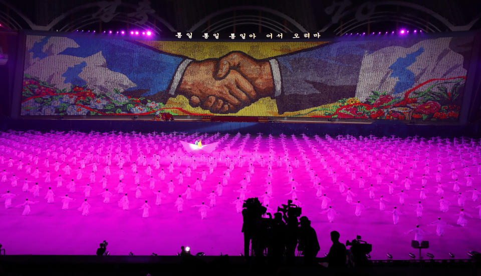 North Koreans perform during the mass games performance of "The Glorious Country" at May Day Stadium in Pyongyang, North Korea, Wednesday, Sept. 19, 2018. (Pyongyang Press Corps Pool via AP)