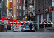 <p>Police stands guard in a street near a place where a man drove a van into a group of people sitting outside a popular restaurant in the old city centre of Muenster, Germany, April 7, 2018. (Photo: Leon Kuegeler/Reuters) </p>