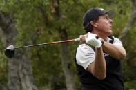 Phil Mickelson hits from the 11th tee during the second round of the Zozo Championship golf tournament Friday, Oct. 23, 2020, in Thousand Oaks, Calif. (AP Photo/Marcio Jose Sanchez)