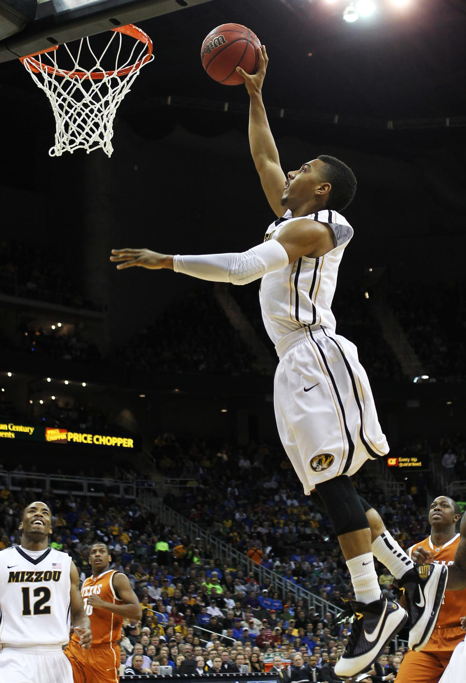 KANSAS CITY, MO - MARCH 09: Phil Pressey #1 of the Missouri Tigers dunks against the Texas Longhorns in the first half during the semifinals of the 2012 Big 12 Men's Basketball Tournament at Sprint Center on March 9, 2012 in Kansas City, Missouri. (Photo by Jamie Squire/Getty Images)