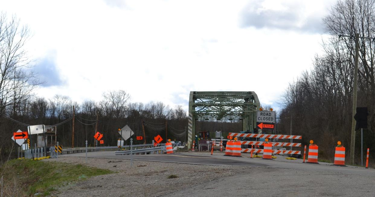 Orange cones and gates are seen around the State Road 135 bridge south of Morgantown. A temporary runaround was constructed directly east of the bridge.