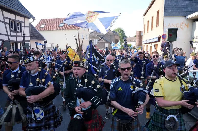 The Tartan Army take part in an organised walk to the stadium