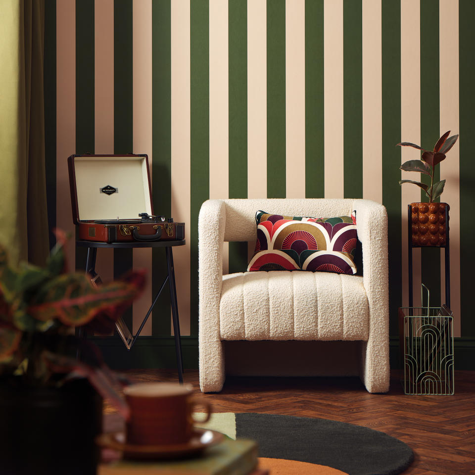 Green and neutral block stripe wallpaper in living room