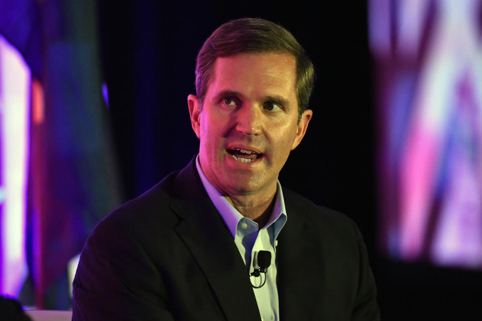 Kentucky Gov. Andy Beshear responds to a question from the moderator during the Gubernatorial Forum at the 2023 Kentucky Chamber of Commerce annual meeting dinner in Louisville, Ky., Wednesday, Sept. 20, 2023. (AP Photo/Timothy D. Easley)