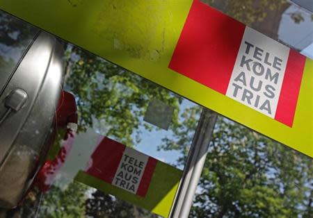 A Telekom Austria phone booth is pictured in Vienna April 23, 2014. REUTERS/Heinz-Peter Bader