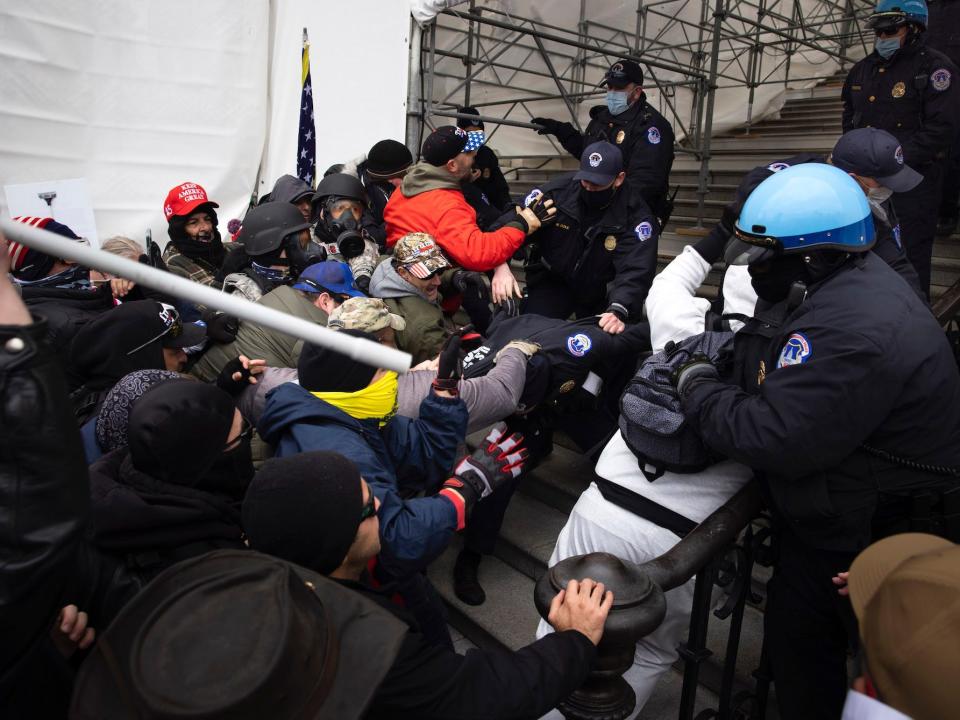 Trump supporters fighting police on January 6
