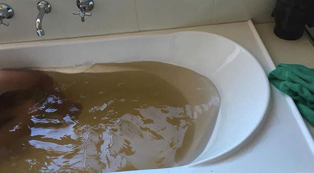 The bath bomb turned the children's water an unfortunate shade of brown. Source: Facebook/ Andrea Lawrence