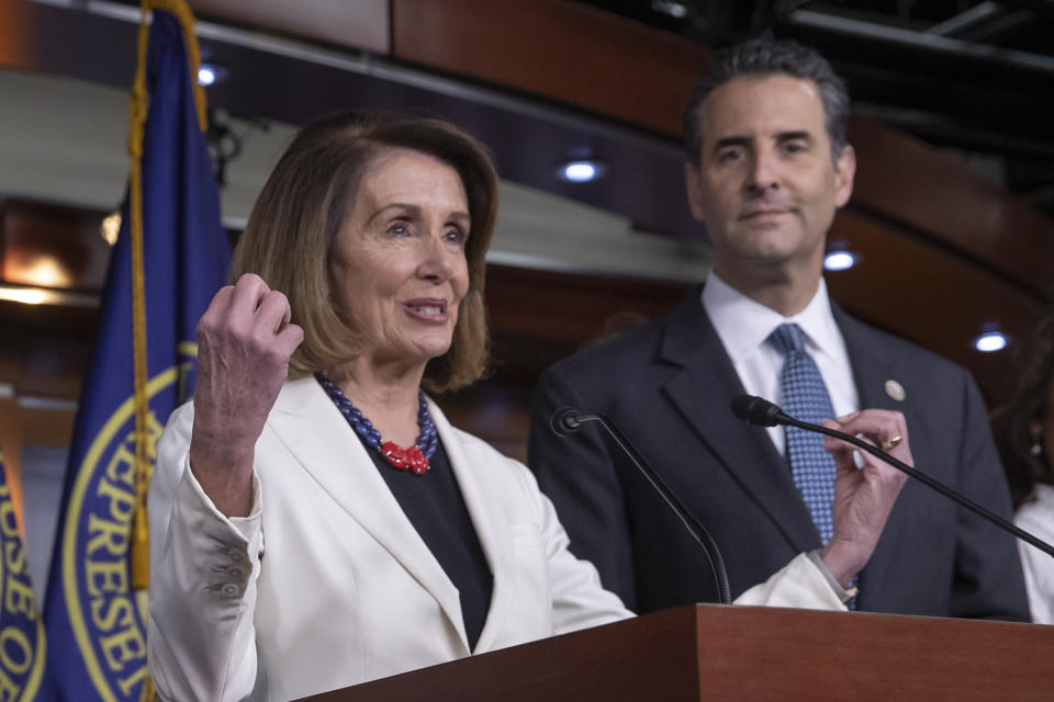 In this Nov. 30, 2018 photo, House Minority Leader Nancy Pelosi, D-Calif., is joined by Rep. John Sarbanes, D-Md., at a news conference to discuss their priorities when they assume the majority in the 116th Congress in January, at the Capitol in Washington. While tea party Republicans swept to power to stop things -- repeal Obamacare, roll back environmental regulations and decrease the size and scope of government -- Democrats are marching into the majority to build things back up. And after spending eight downcast years in the minority, they can’t wait to get started. (AP Photo/J. Scott Applewhite)