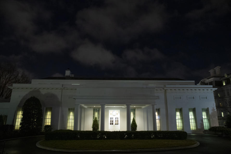 All the lights are on in the windows of the West Wing of the White House after news of a missile attack on an Iraqi air base housing U.S. troops, Tuesday, Jan. 7, 2020, in Washington. (AP Photo/Alex Brandon)