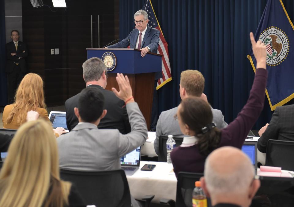 Federal Reserve Board Chairman Jerome Powell takes questions at a news conference on October 30, 2019 in Washington, DC. - The US Federal Reserve cut its benchmark interest rate for the third straight time on Wednesday, but the central bank remains divided, with two of the 10 voting members dissenting. And the Fed's policy-setting Federal Open Market Committee made a key change in the wording of the statement, which makes it less certain it will make another move in December. (Photo by Eric BARADAT / AFP) (Photo by ERIC BARADAT/AFP via Getty Images)