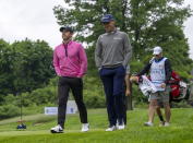 Rory McIlroy (left) of Northern Ireland and Justin Thomas of the USA walk down the 9th fairway during the first round of the Canadian Open in Toronto on Thursday, June 9, 2022. (Frank Gunn/The Canadian Press via AP)