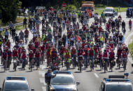 Demonstrators ride their bikes on a highway in Frankfurt, Germany, Saturday, Sept. 14, 2019. About 20 000 cyclists took part in a protest star ride against the government's transport policy on occasion of this year's IAA Auto Show.(AP Photo/Michael Probst)