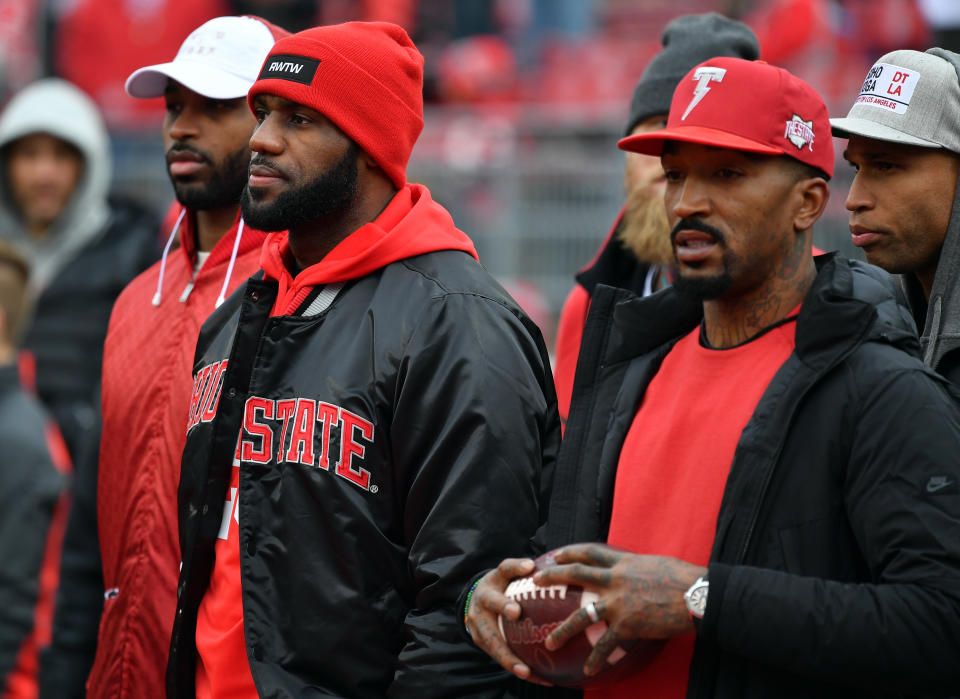 COLUMBUS, OH - NOVEMBER 26:   (R-L) J.R. Smith and Lebron James of the Cleveland Cavaliers are seen on the field prior to the game between the Michigan Wolverines and Ohio State Buckeyes at Ohio Stadium on November 26, 2016 in Columbus, Ohio.  (Photo by Jamie Sabau/Getty Images)