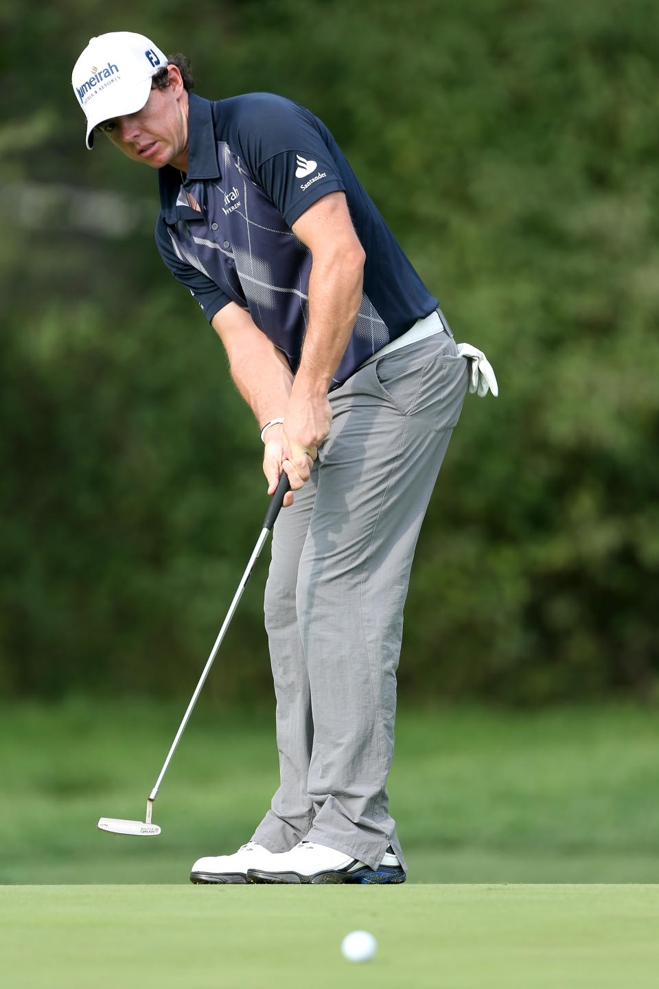 CARMEL, IN - SEPTEMBER 07: Rory McIlroy of Northern Ireland attempt a putt on the third hole green during the second round of the BMW Championship at Crooked Stick Golf Club on September 7, 2012 in Carmel, Indiana. (Photo by Warren Little/Getty Images)