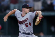 Minnesota Twins starting pitcher Sonny Gray throws to a Texas Rangers during the second inning of a baseball game Friday, July 8, 2022, in Arlington, Texas. (AP Photo/Tony Gutierrez)