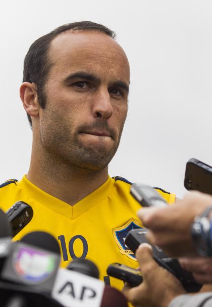 Landon Donovan talks to the media after a training session. (AP)