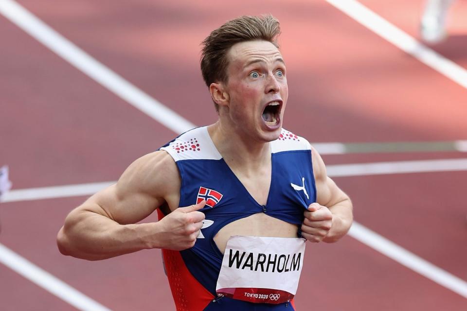 Warholm reacts after winning the Olympic gold medal in Tokyo (Getty)