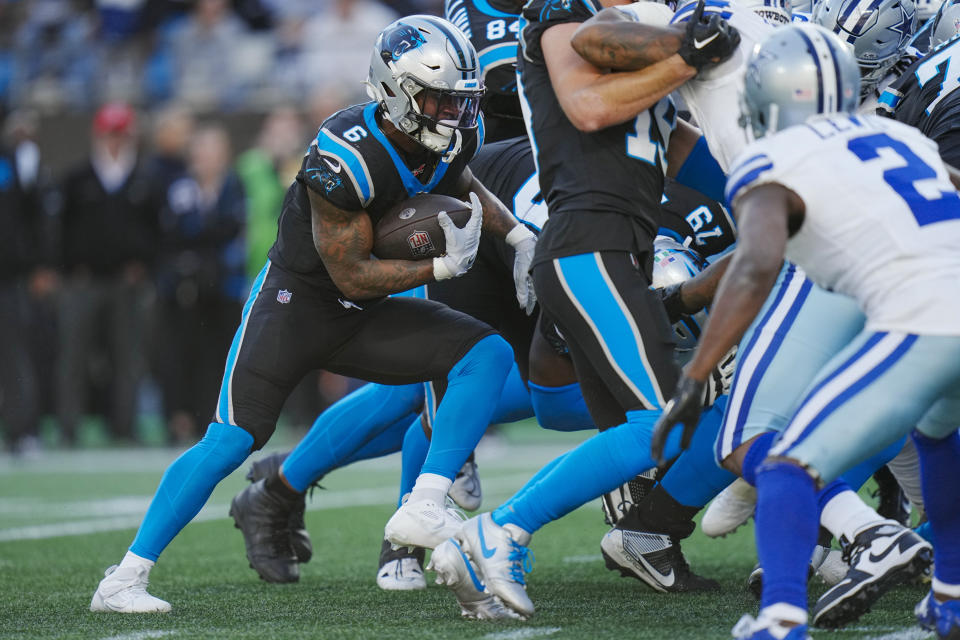 Carolina Panthers running back Miles Sanders runs against the Dallas Cowboys during the second half of an NFL football game Sunday, Nov. 19, 2023, in Charlotte, N.C. (AP Photo/Rusty Jones)