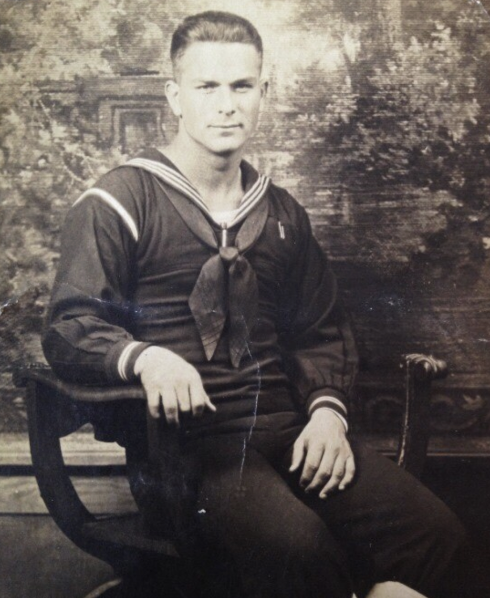 A young man in a uniform many years ago