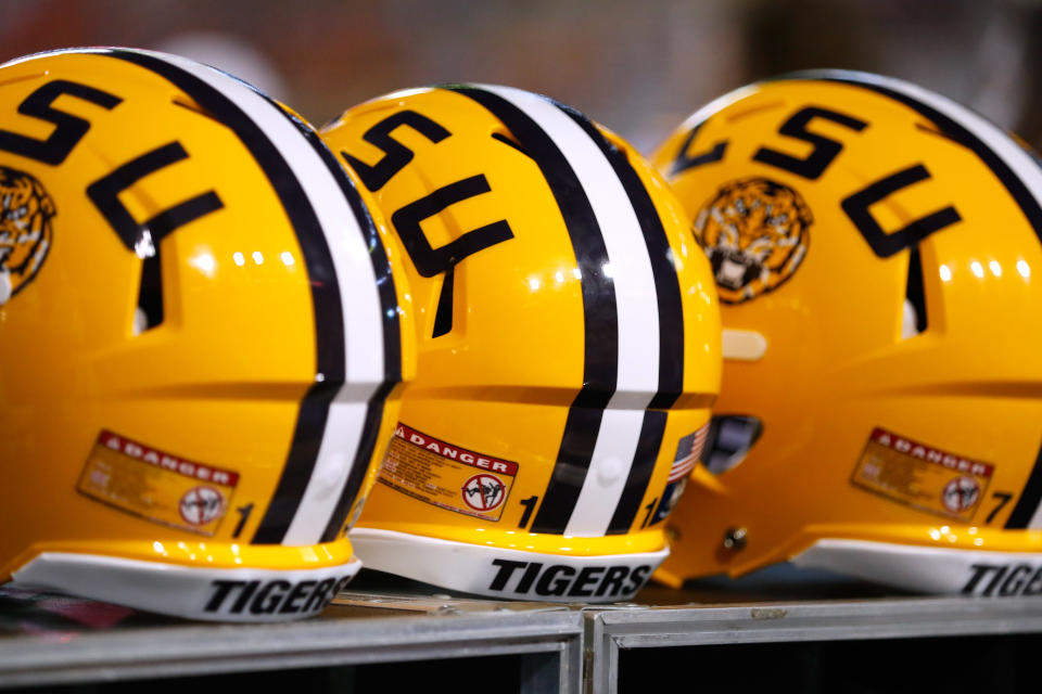 The LSU logo is seen on a helmet during the first half of an NCAA college football game in Baton Rouge, La., Saturday, September 6, 2014. (AP Photo/Jonathan Bachman)