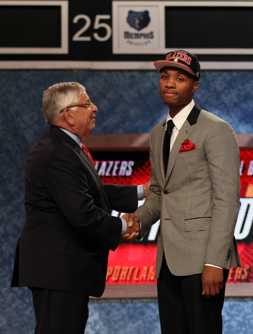 NEWARK, NJ - JUNE 28: Damian Lillard (R) of Weber State greets NBA Commissioner David Stern (L) after he was selected number six overall by the Portland Trail Blazers during the first round of the 2012 NBA Draft at Prudential Center on June 28, 2012 in Newark, New Jersey. NOTE TO USER: User expressly acknowledges and agrees that, by downloading and/or using this Photograph, user is consenting to the terms and conditions of the Getty Images License Agreement. (Photo by Elsa/Getty Images)