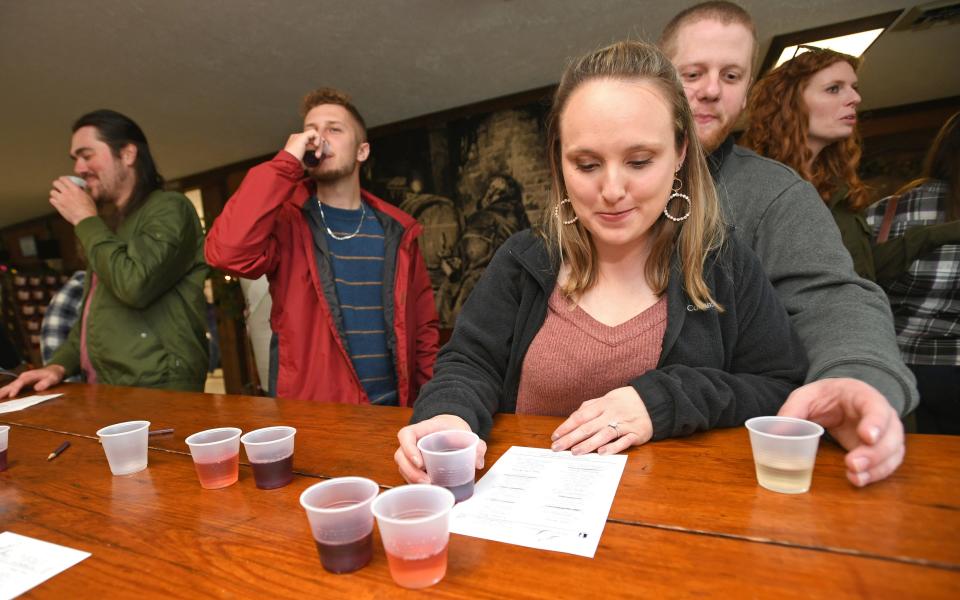From left: Reese Wamsley, 28, of Raleigh, North Carolina; Sean Carlson, 23, of Stoneboro, Mercer County; Kelly Gehlbach, 27, of Wilmington, Ohio; Gehlbach's fiancee Matthew Carlson, 28, of Stoneboro; and Ashley West, 28, of Bethel Park, Allegheny County are shown, May 7, 2022 in the wine tasting room at Penn Shore Winery in North East Township. The group traveled together on a wine tour to celebrate an upcoming wedding of a couple who is either a friend or family member of everyone in the group.