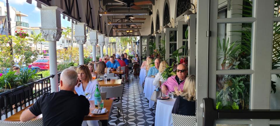 Del Mar's covered terrace on Fifth Avenue South in Naples.