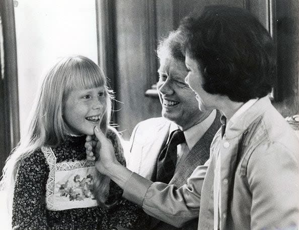 Washington, D.C.: Amy Carter with her father Jimmy and mother Rosalynn Carter in a family suite at the Americana Hotel in Washington, D.C.  on July 14, 1976. (Photo by Dick Yarwood/Newsday RM via Getty Images)