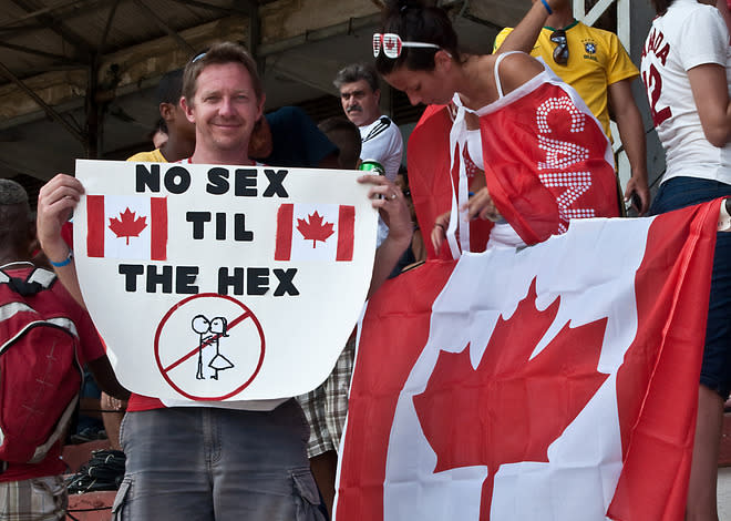 A Canadian football fan shows a poster during the FIFA World Cup Brazil 2014 CONCACAF qualifier match between Cuba and Canada at the Pedro Marrero stadium in Havana on June 8, 2012. Canada won 1-0. AFP PHOTO/STRSTR/AFP/GettyImages