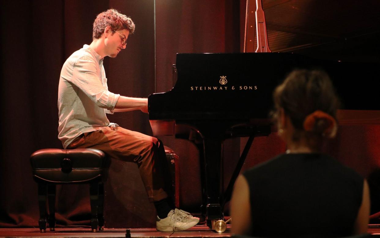 An audience of one: pianist Elliot Galvin performs bespoke music for a solitary audience member - Jonathan Brady/PA Wire