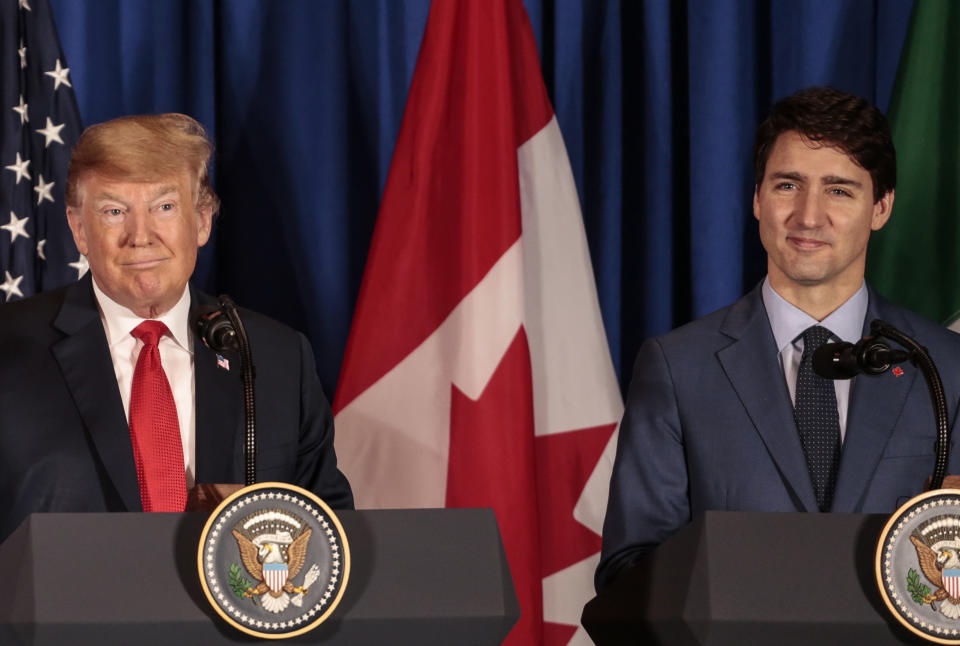 U.S. president Donald Trump, left, and Justin Trudeau, Canada’s prime minister, smile during a news conference before the signing of the United States-Mexico-Canada Agreement (USMCA) at the G-20 Leaders’ Summit in Buenos Aires, Argentina, on Friday Nov. 30, 2018. Photographer: Sarah Pabst/Bloomberg