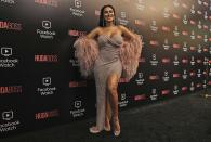 Huda Kattan poses at the Huda Boss Facebook Watch screening celebration in Dubai, United Arab Emirates, Wednesday, Oct. 9, 2019. (AP Photo/Kamran Jebreili)