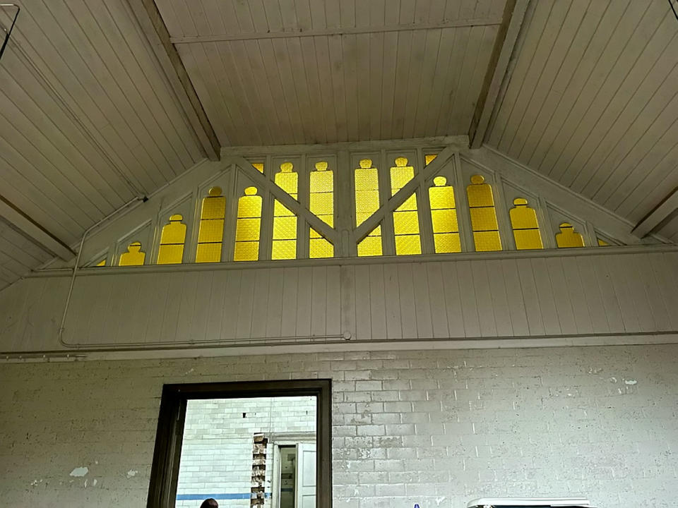 Pictures of the building in Leek, Staffordshire, show the seemingly crumbling interior, with rotten wood and stained tile walls visible. (SWNS)