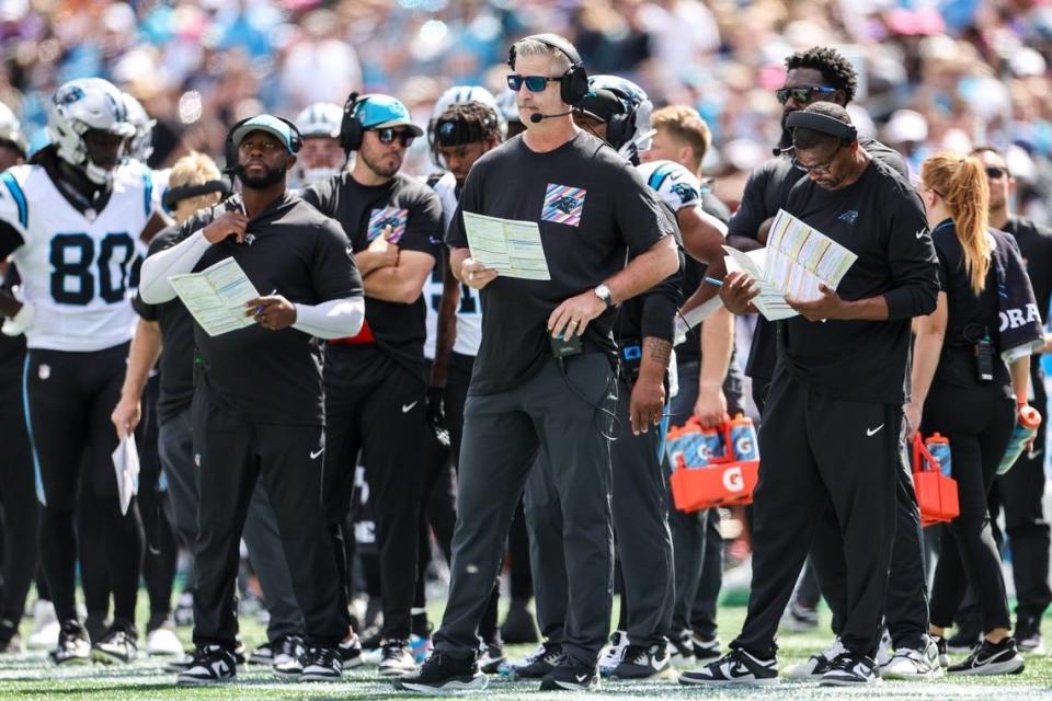 Panthers Head Coach Frank Reich, center, watches the game from the sideline during the game against Minnesota at Bank of America Stadium on Sunday, October 1, 2023 in Charlotte, NC.