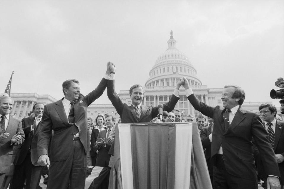 Reagan would prove to be the more popular conservative candidate in the race for the Presidency and would eventually gain the Republican nomination, but in a surprising turn of events, Reagan would pick Bush to be his vice presidential nominee. Here, the two candidates join Senate Majority leader Howard Baker for a rally on Capitol Hill in September 1980.