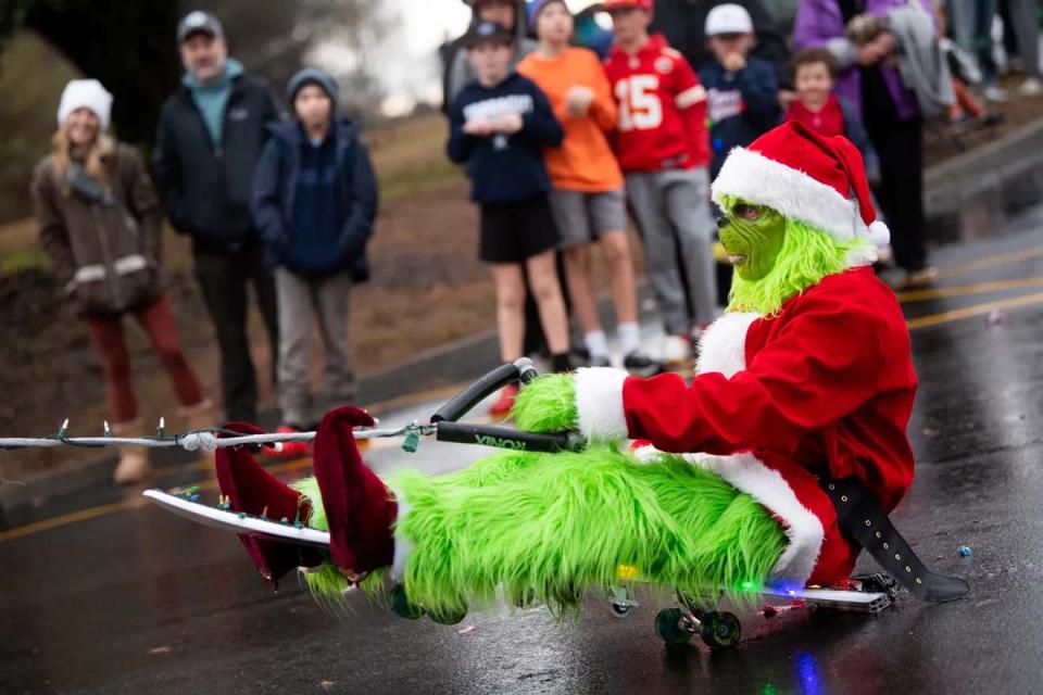The Grinch entertains the crowd with his antics at the Farragut Christmas parade held at Farragut Intermediate and High Schools on Dec. 10.