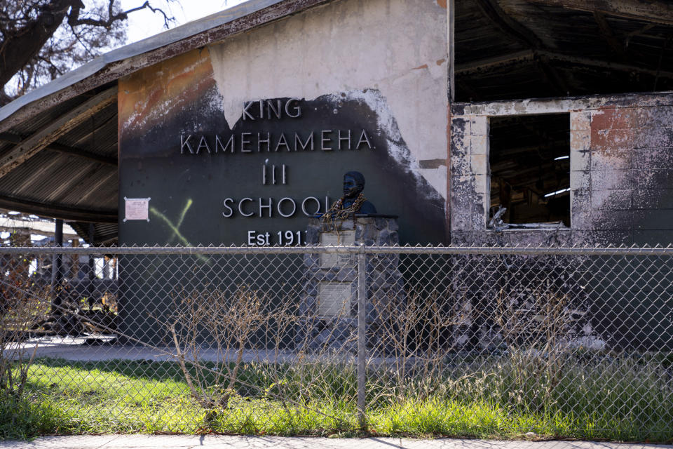 The remains of the King Kamehameha III Elementary School in Zone 12A is seen Dec. 8, 2023, in Lahaina, Hawaii. The area reopened Monday, Dec. 11, to residents and owners with entry passes. (AP Photo/Lindsey Wasson)