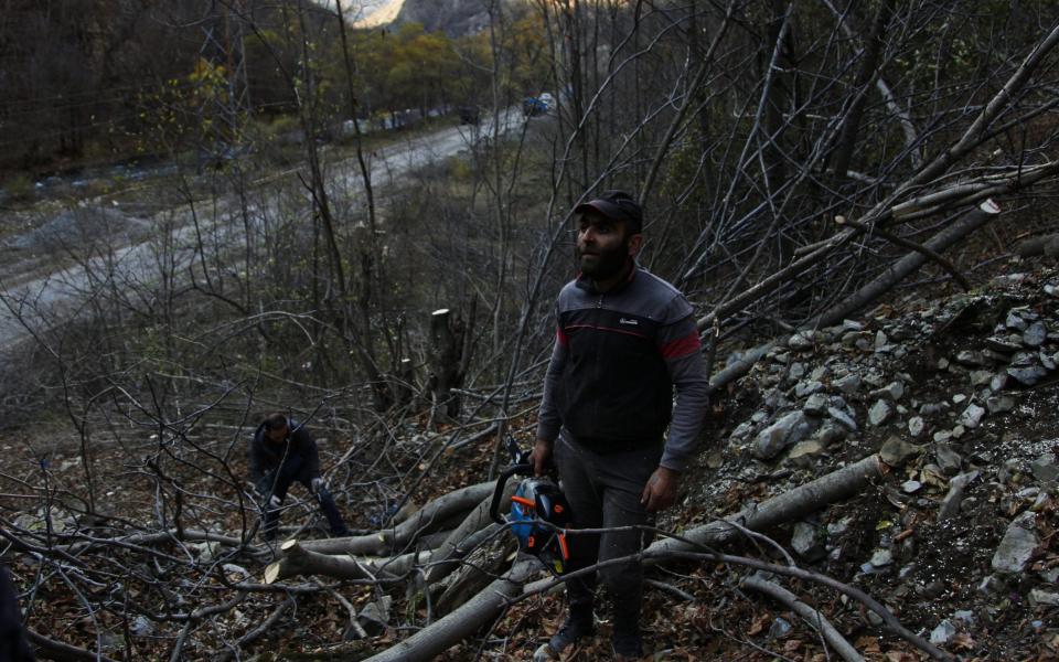 Loggers are cutting down trees in the area before it is ceded to Azerbaijan  - JACK LOSH FOR THE TELEGRAPH