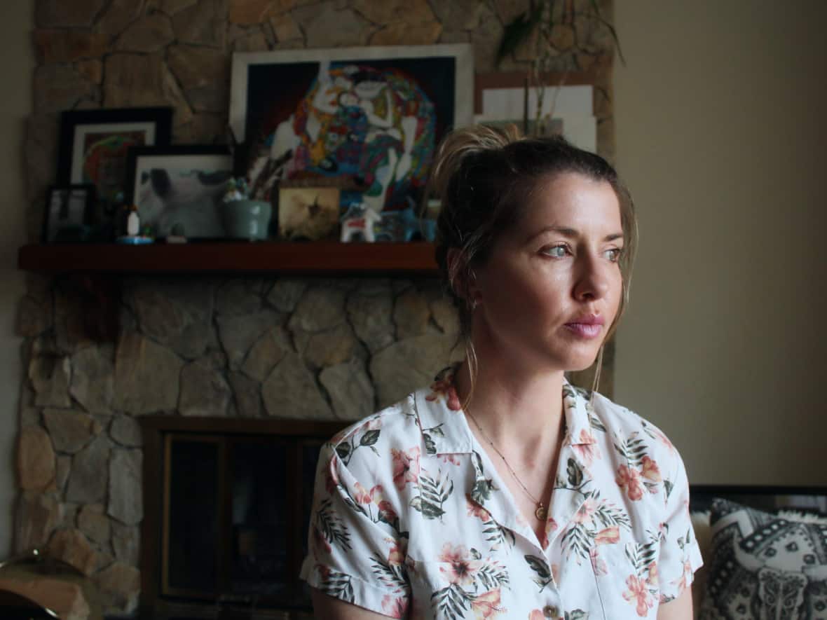 For single mom Courtney Townsend, having her rent subsidy wiped out by a rent increase means she's back to deciding between paying utilities versus groceries. (Karina Zapata/CBC - image credit)