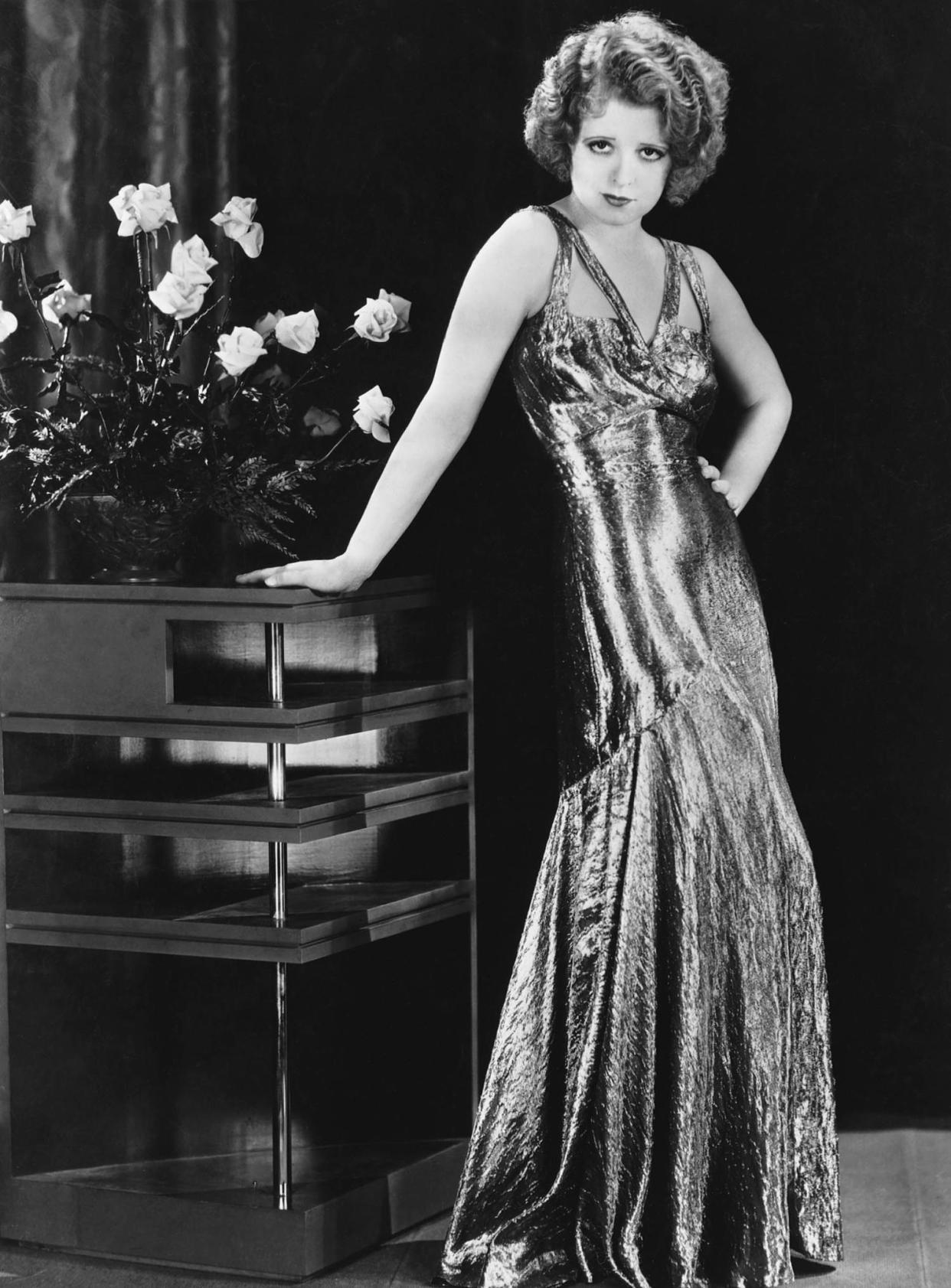 Actress Clara Bow in a silver dress (Corbis via Getty Images)