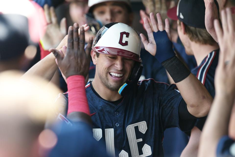 May 19, 2024; Cleveland, Ohio, USA; Cleveland Guardians center fielder Tyler Freeman (2) celebrates after scoring during the second inning against the Minnesota Twins at Progressive Field. Mandatory Credit: Ken Blaze-USA TODAY Sports