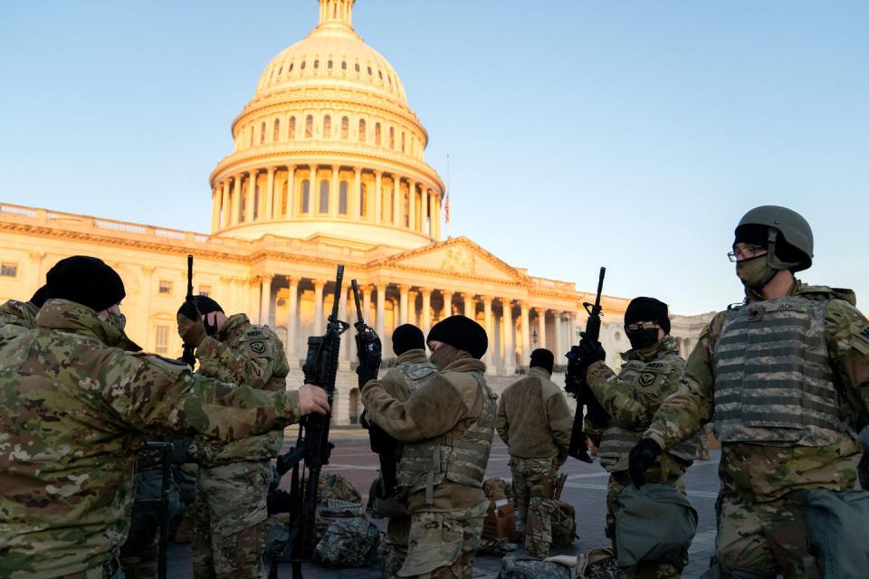 <p>Weapons are distributed to members of the National Guard outside the U.S. Capitol on January 13, 2021 in Washington, DC.</p>