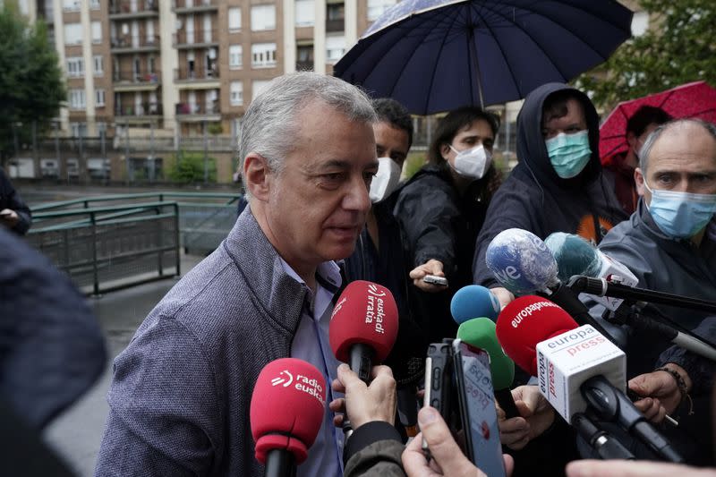 Basque premier Inigo Urkullu talks to reporters after voting during the Basque regional elections, amid the coronavirus disease (COVID-19) outbreak, in Durango