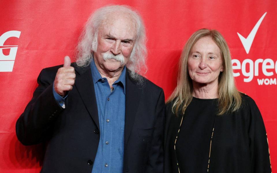 Singer David Crosby and wife Jan Dance pose at the 2014 MusiCares Person of the Year gala - Reuters