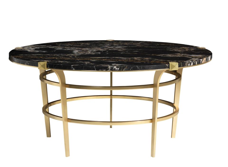 <p>The Simpson coffee table in Portoro marble.</p><p><b>More: <a rel="nofollow noopener" href="http://www.architecturaldigest.com/gallery/home-libraries-slideshow?mbid=synd_yahoolife" target="_blank" data-ylk="slk:30 Stunning Home Libraries that Are a Book Lover's Dream;elm:context_link;itc:0;sec:content-canvas" class="link ">30 Stunning Home Libraries that Are a Book Lover's Dream</a></b></p>