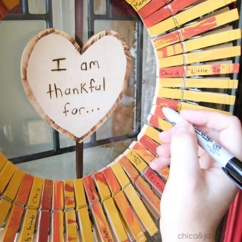 <p>Chic and Jo</p><p><a href="https://www.chicaandjo.com/thanksgiving-clothespin-wreath/" rel="nofollow noopener" target="_blank" data-ylk="slk:Chic and Jo;elm:context_link;itc:0;sec:content-canvas" class="link rapid-noclick-resp"><em>Chic and Jo</em></a> shows you how to make a unique wreath that has a very special message! This project not only looks pretty, but it also lets all your guests write what they’re thankful for on it. </p><p><strong>Related: </strong><strong><a href="https://parade.com/1056665/kelseypelzer/thanksgiving-jokes/" rel="nofollow noopener" target="_blank" data-ylk="slk:Thanksgiving Jokes;elm:context_link;itc:0;sec:content-canvas" class="link rapid-noclick-resp">Thanksgiving Jokes</a></strong></p>