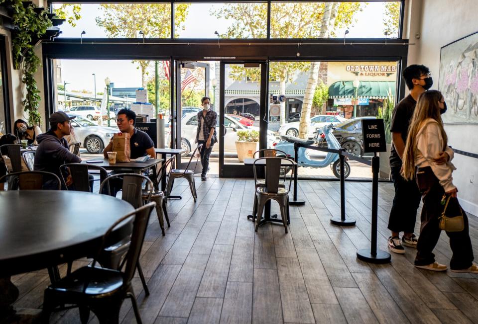 Customers inside a coffee shop.