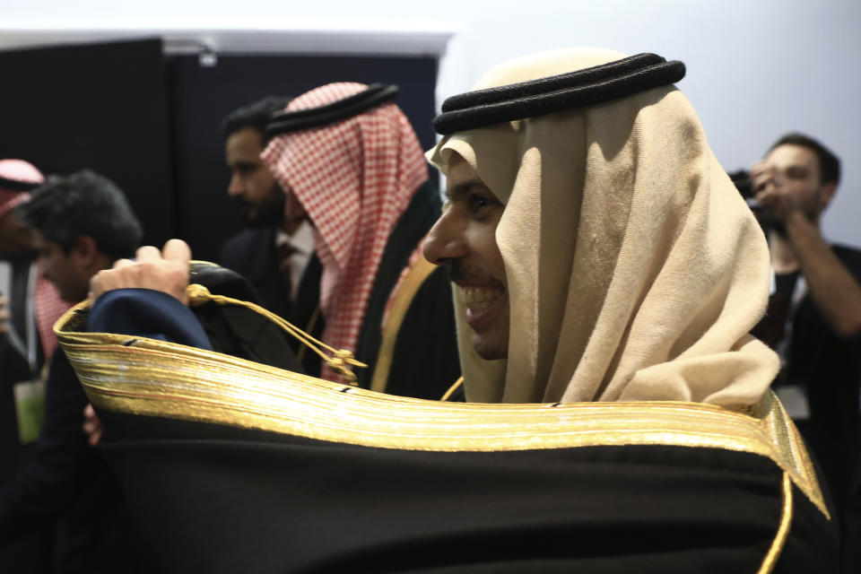 Saudi Foreign Minister Prince Faisal bin Farhan smiles after the Bureau International des Expositions, or BIE, announced the vote Tuesday, Nov. 28, 2023 in Issy-les-Moulineaux, outside Paris. Saudi Arabia's capital Riyadh was chosen to host the 2030 World Expo, beating out South Korean port city Busan and Rome for an event expected to draw millions of visitors. Saudi Arabia's capital Riyadh was chosen on Tuesday to host the 2030 World Expo, beating out South Korean port city Busan and Rome for an event expected to draw millions of visitors. Riyadh was picked by a majority of 119 out of 165 votes by the member states. (AP Photo/Aurelien Morissard)